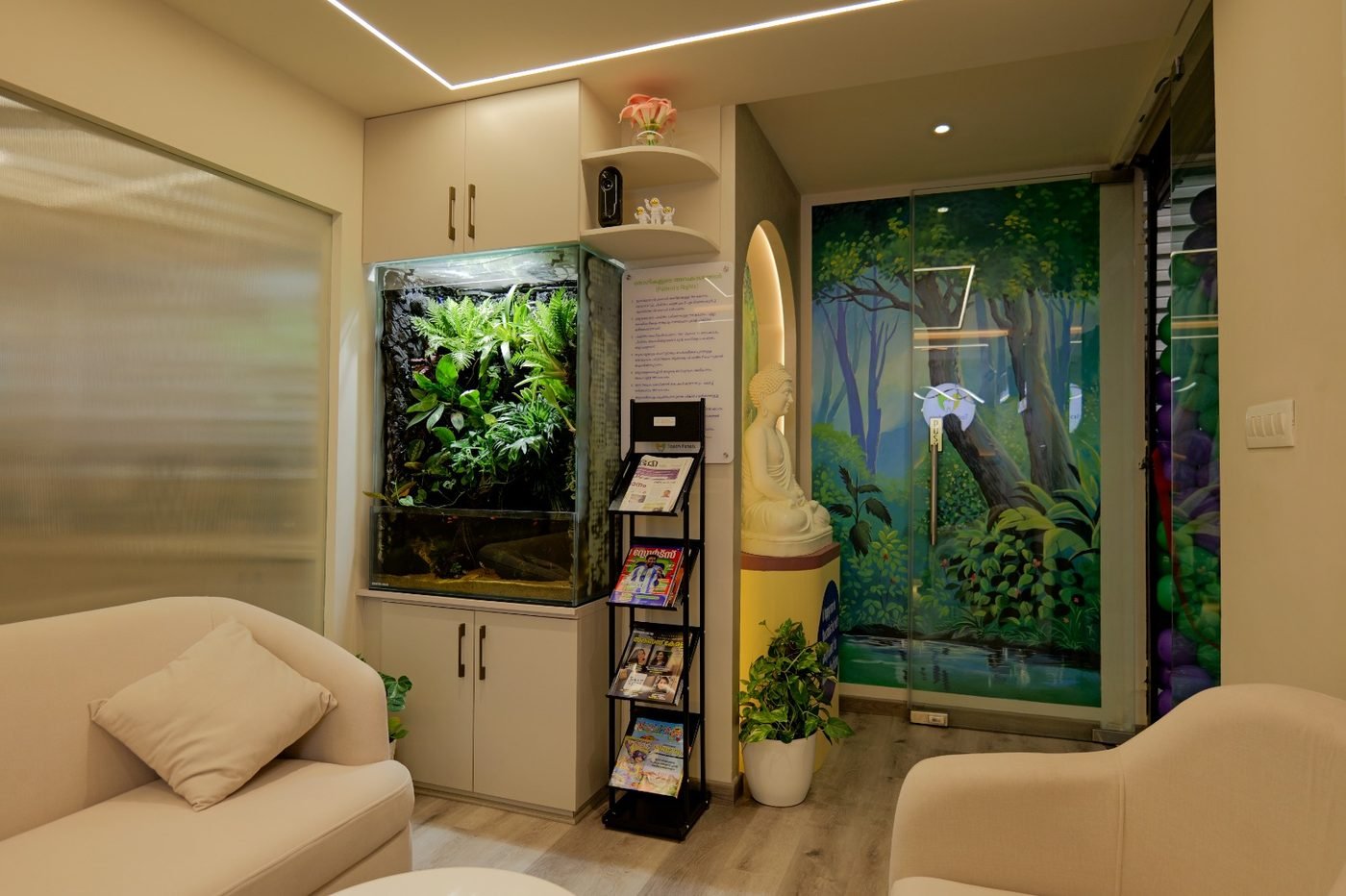 Family-friendly waiting area with reading corner at Tooth Petals Kozhikode