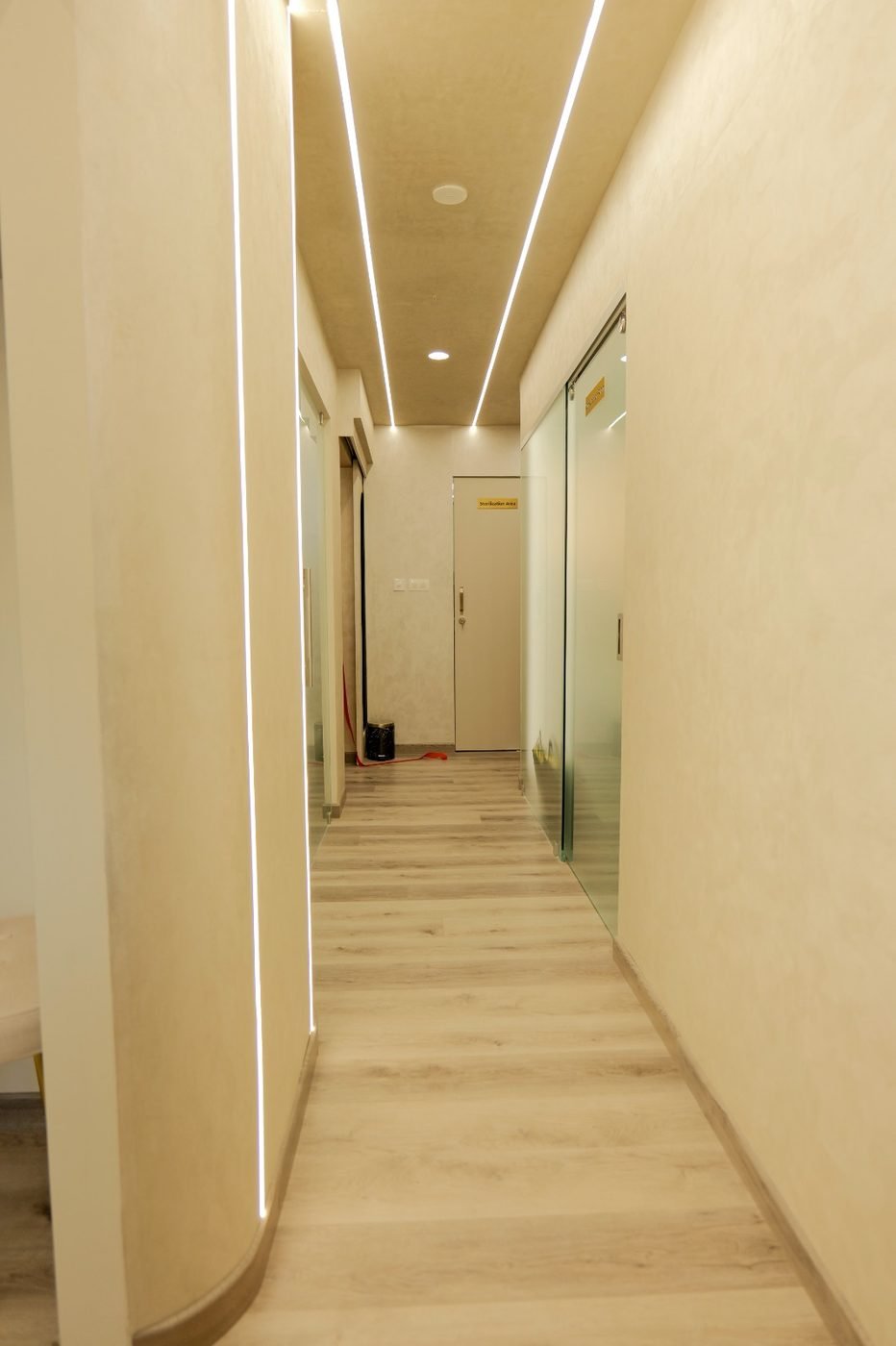 Clean, well-lit clinic corridor at Tooth Petals Dental Care Centre Kozhikode